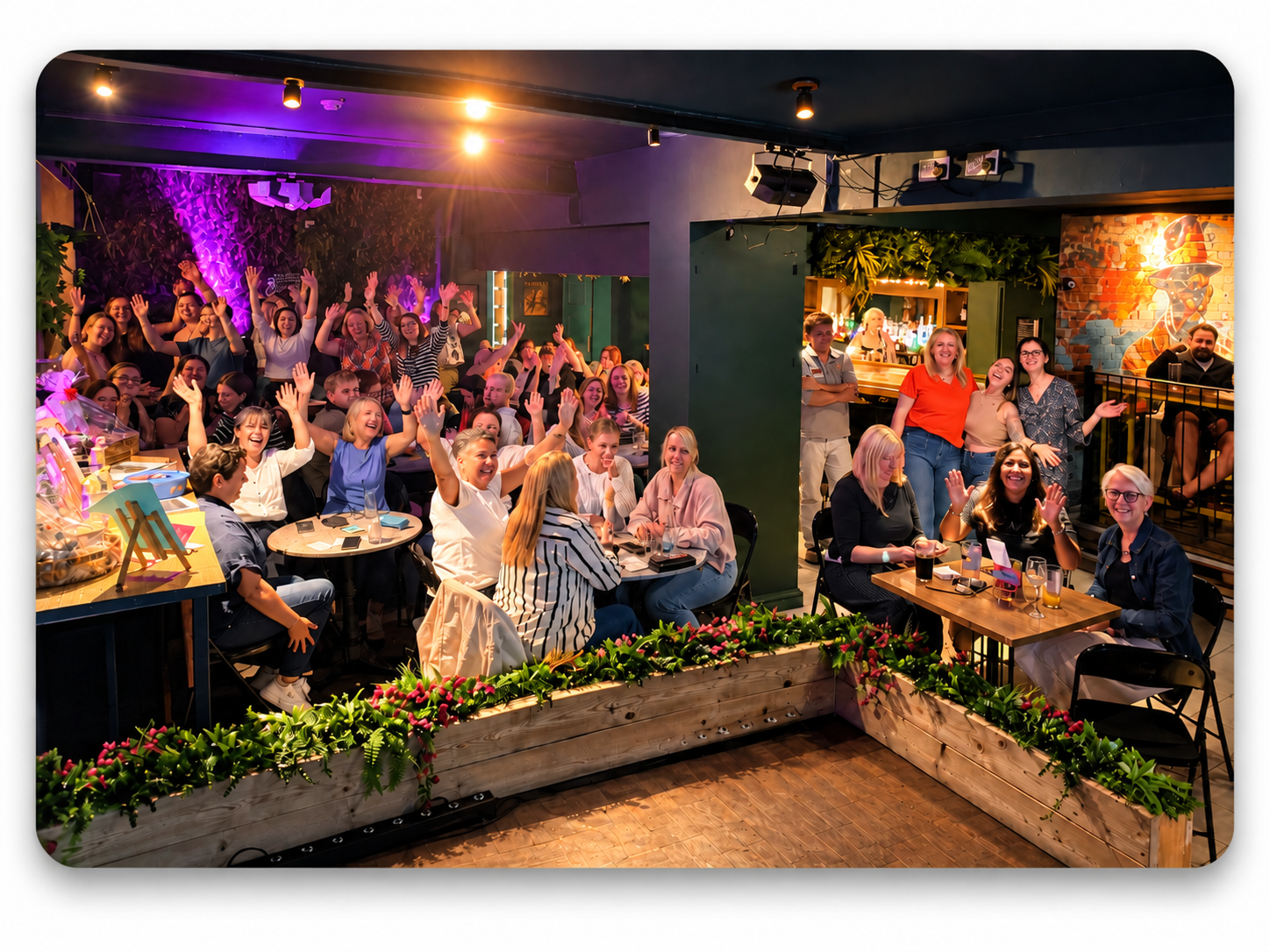 A lively DJ Findy SpeedQuizzing crowd enjoying quiz night